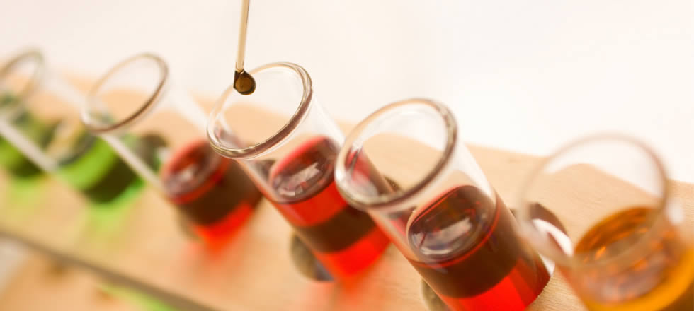 Test tubes with coloured liquids